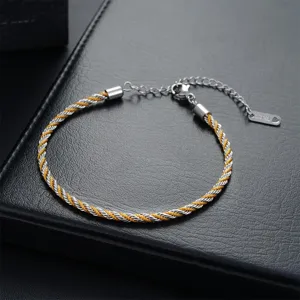 Bracelet tressé en acier titane, design cordon argent et jaune, bijou de mode tendance.