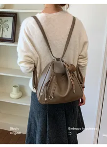 Stylish convertible backpack for women, large capacity leather shoulder bag for daily commute.