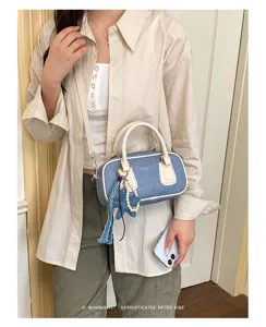 Retro denim Boston shoulder bag with white trim and chic charm for women daily fashion.