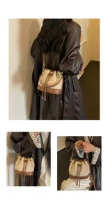 Gedetailleerd overzicht van canvas en lederen emmertas, toont crossbody en handstijlen.