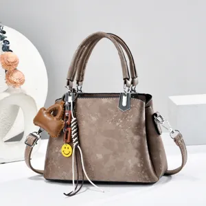 Elegante borsa a mano marrone da donna borsa a tracolla vintage con ciondoli carini stile quotidiano