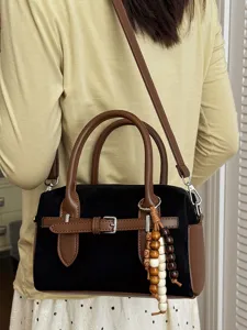 Chic contrast color women shoulder bag, stylish brown and black pillow handbag for daily use.