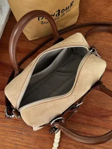 Chic suede pillow bag for women, trendy commuter handbag and stylish everyday crossbody bag.
