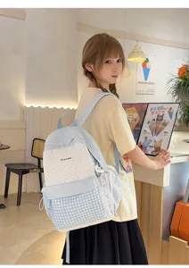 Japanese cute sweet style large capacity student backpack with blue plaid and polka dot design.