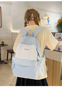 Japanese cute large capacity school backpack with light blue polka dot and plaid design.