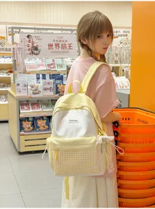 Cute Japanese style plaid backpack for students, large capacity daily school bag with lace.