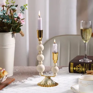 Retro wooden bead iron candle holder for home indoor living room decor and table lighting display.