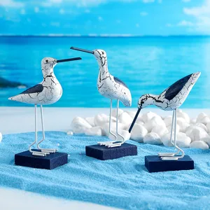 Ensemble de figurines d'oiseaux de mer craquelés en bois, décorations de bureau.