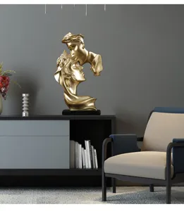 Modern golden couple kiss resin sculpture art ornament for living room home decor gift