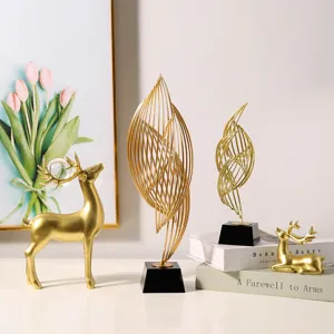 Modern abstract golden art sculpture ornament desktop decor for living room home table.