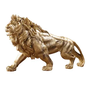 Sculpture de lion en résine dorée, figurine animale majestueuse pour déco bureau salon.