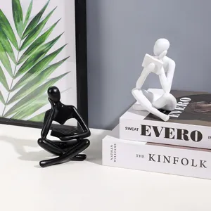 Set van abstracte hars lezend figuur beelden, moderne denker sculptuur voor bureau.