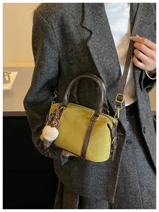 Vintage green boston handbag with brown leather trim, stylish women shoulder crossbody bag.