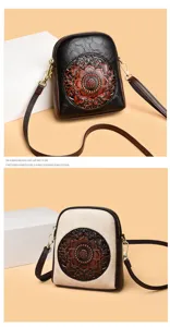 Vintage embossed floral crossbody phone bag for women, stylish small leather shoulder bag.