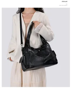 Womens black pu leather shoulder tote bag, large capacity casual commuting handbag detail view.