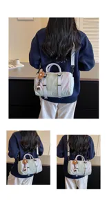 Borsa a tracolla casual da donna in tessuto, elegante borsa da viaggio con grazioso ciondolo.