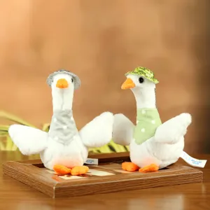 Cute plush duck toy pair with hats and scarves, soft stuffed animal gift for kids.