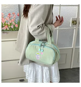 Hellgrüne Kosmetiktasche aus Segeltuch mit süßem Astronautenprint, praktische Handtasche.