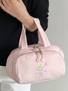 Rosa Kosmetik Tasche mit Astronauten Print, Blumen Reißverschluss, ideal für den Alltag.