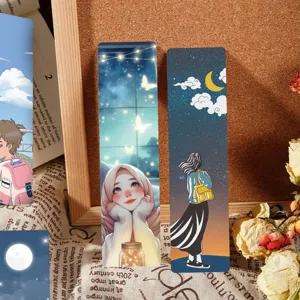 Detail view of paper bookmarks featuring starry night and anime illustrations for reading.