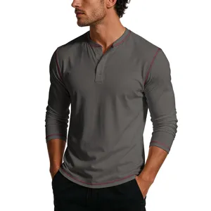 Men's grey long sleeve Henley shirt detail view, featuring red stitching and buttons.