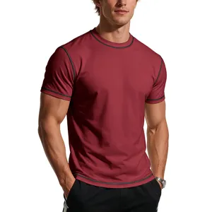 Detailed view of men's slim-fit athletic short-sleeve t-shirt in burgundy with contrast stitching.