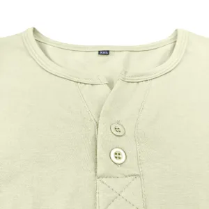 Men's short sleeve Henley shirt detail view showing neckline button placket and solid color fabric