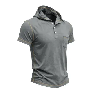 Detail view of men's short sleeve hooded polo shirt with contrast stitching and chest pocket.