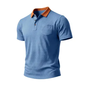 Men's blue short sleeve polo shirt featuring textured fabric, contrast orange collar and chest pocket.