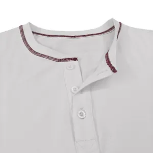 Close-up of cotton long sleeve t-shirt collar, contrast stitching and white buttons detail.