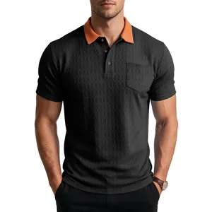 Close-up detail of the textured short sleeve polo shirt with contrast orange collar and pocket.