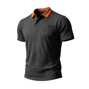 Men's dark grey honeycomb textured short sleeve polo shirt with orange collar and chest pocket.