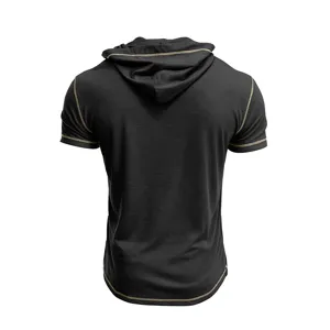 Back detail view of black short sleeve hooded t-shirt with contrast stitching craftsmanship.
