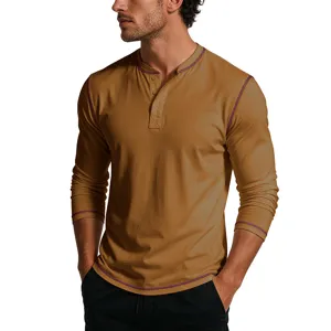 Detail shot of a casual men's long sleeve Henley shirt featuring contrast stitching and button placket.