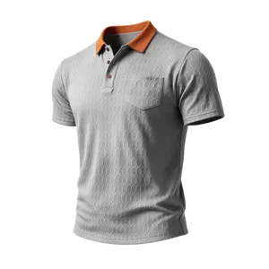 Close-up detail of gray short-sleeve polo shirt with orange collar and chest pocket.
