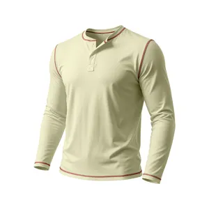 Detail view of mens long sleeve Henley t-shirt in cream with stylish contrast red stitching.