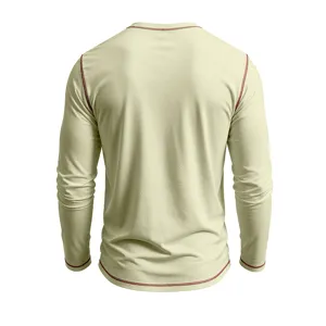 Detail view of casual men's long sleeve t-shirt in beige with contrast stitching.