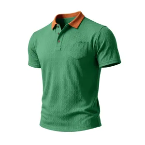 Mens short sleeve green polo shirt featuring orange collar and convenient chest pocket detail.