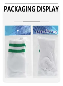 White athletic soccer socks with green stripes, comfortable towel bottom, packaged in bags.