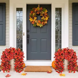Autumn artificial bougainvillea hanging plant and maple wreath for indoor outdoor decor scene.
