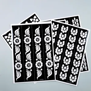Pochoirs de tatouage au henné, motifs creux de fleurs et cœurs autocollants temporaires.