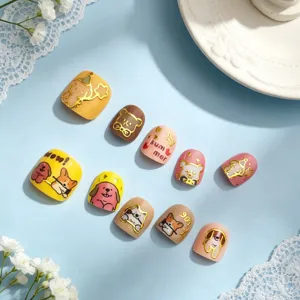 Cute cartoon animal nail stickers with gold foil, perfect for stylish DIY nail art design.