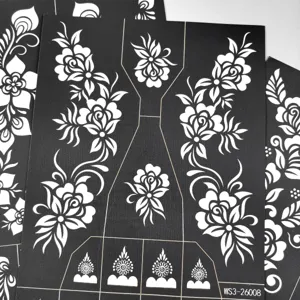 Detailed view of black henna tattoo stencil template featuring intricate floral vine patterns.