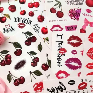Waterproof temporary tattoo stickers featuring red lips, cherries, and cute KISS lettering.