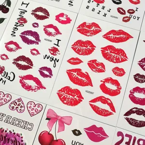 Detail shot of waterproof kiss lips and cherry temporary tattoo stickers for party use.