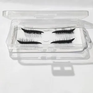 Pestañas postizas con pegatinas de delineador brillante negro en estuche transparente.