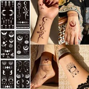Reusable henna tattoo stencil sheets featuring intricate moon and floral patterns for body art design.