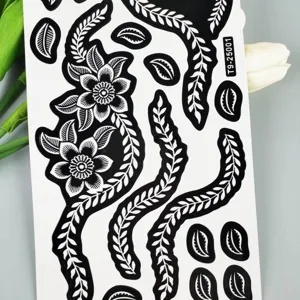 Black lace floral henna tattoo sticker detail view, elegant body art template for creative designs.