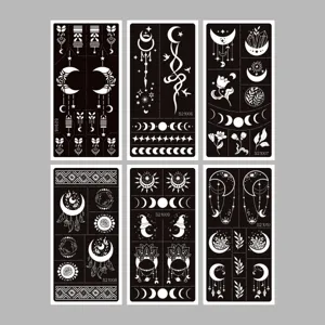 Reusable hollow henna tattoo stencils set featuring moon, floral and celestial bohemian designs for art.