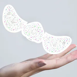 Close-up detail of colorful butterfly and star face sticker sheet, perfect for party makeup.